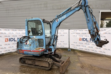Afbeelding van Minigraafmachine – rupsonderstel – met cabine en graafarm
