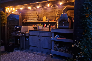 Afbeelding van De lekkerste Pizza's genieten op een mooi plekje