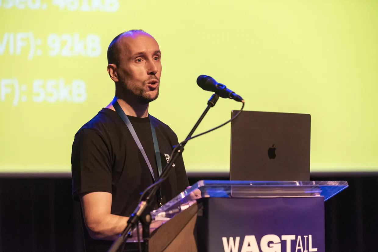 Alex Tomkins delivering his talk