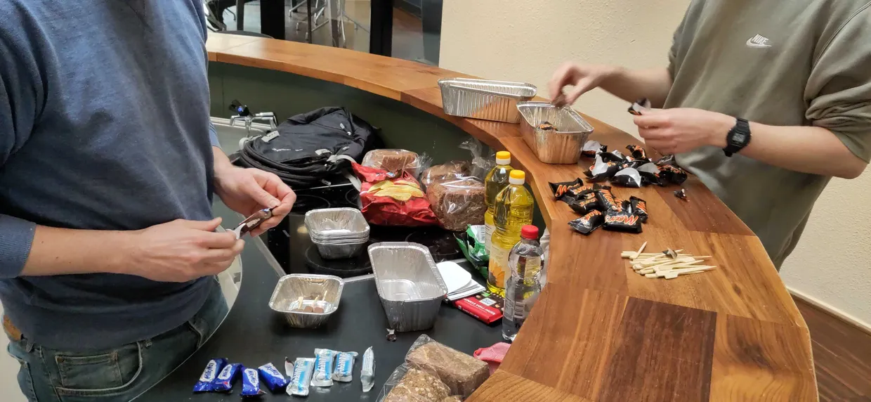 Coen and Esper preparing the deep-fried snacks