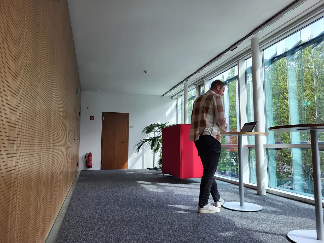 Siemen doing a online call from Zumtobel's office