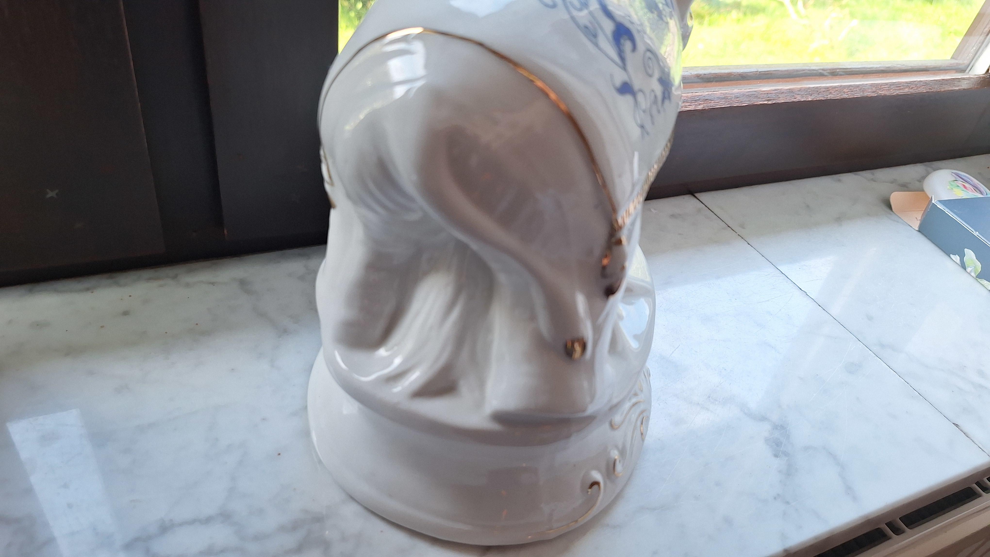 Porseleinen beeldje van een olifant met blauwe bloemmotieven en goudkleurige details – foto 5 – kavel bij Goeiendeal, Houthalen-Helchteren