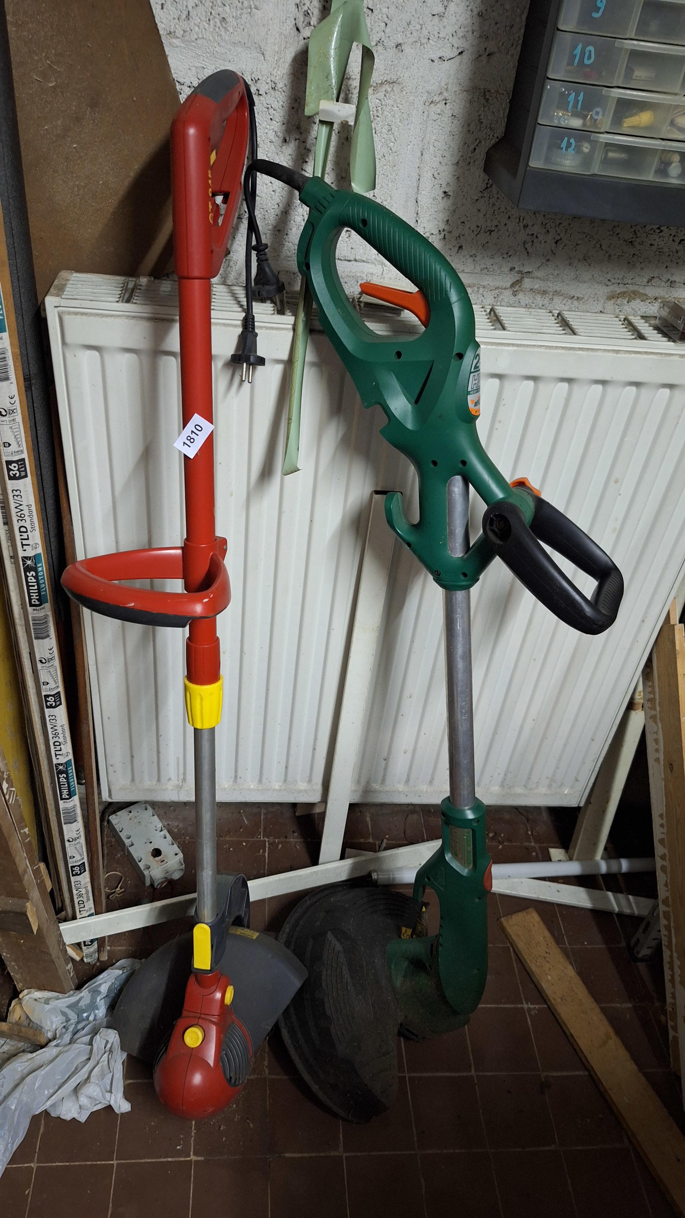 Twee elektrische grastrimmers waaronder een rood model en een groen model van Wolf Garten – getest en werkend – foto 2 – kavel bij Goeiendeal, Houthalen-Helchteren