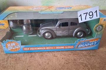 Afbeelding van Punch Buggy Jada Volkswagen Beetle & Boxing Gloves modelauto