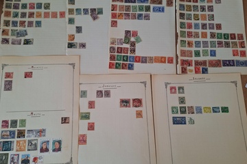 Afbeelding van Oude postzegels op bladen wereld 