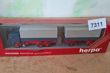 Afbeelding van Herpa vrachtwagen met huif en aanhanger (blauw/rood) (1:87)
