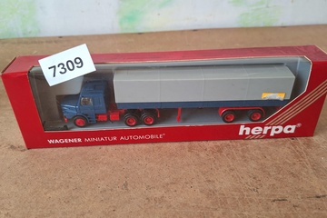 Afbeelding van Herpa Mercedes-Benz NG vrachtwagen met huifoplegger (1:87)