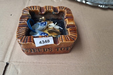 Afbeelding van Asbak met spreuk & inhoud