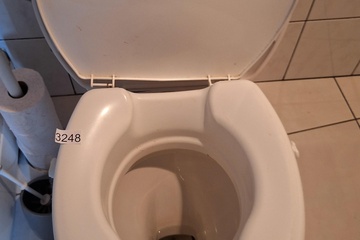 Afbeelding van Wc bril verhoger met schade