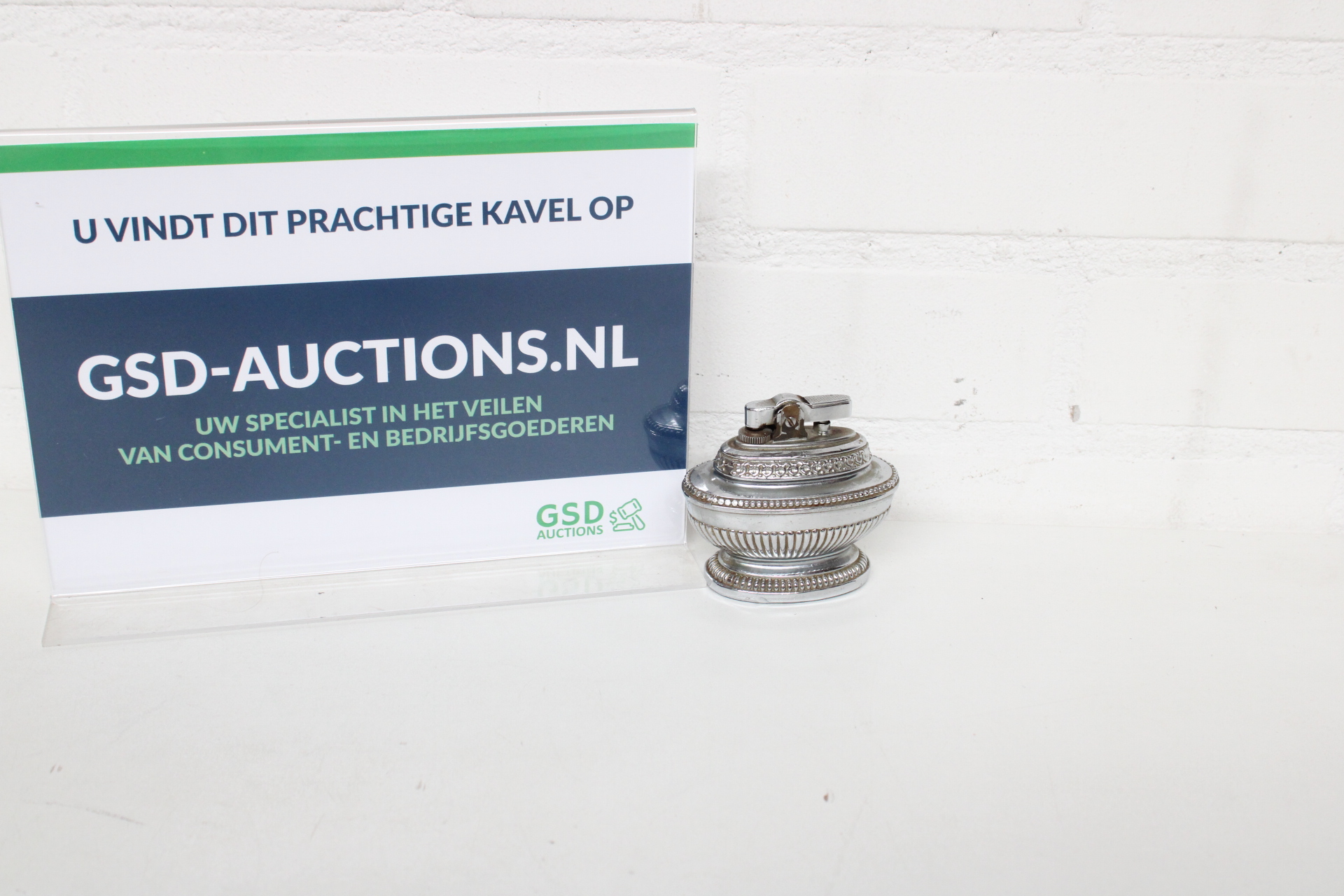 Vintage aansteker met metalen sierdesign – kavel bij GSD Auctions, Zoeterwoude