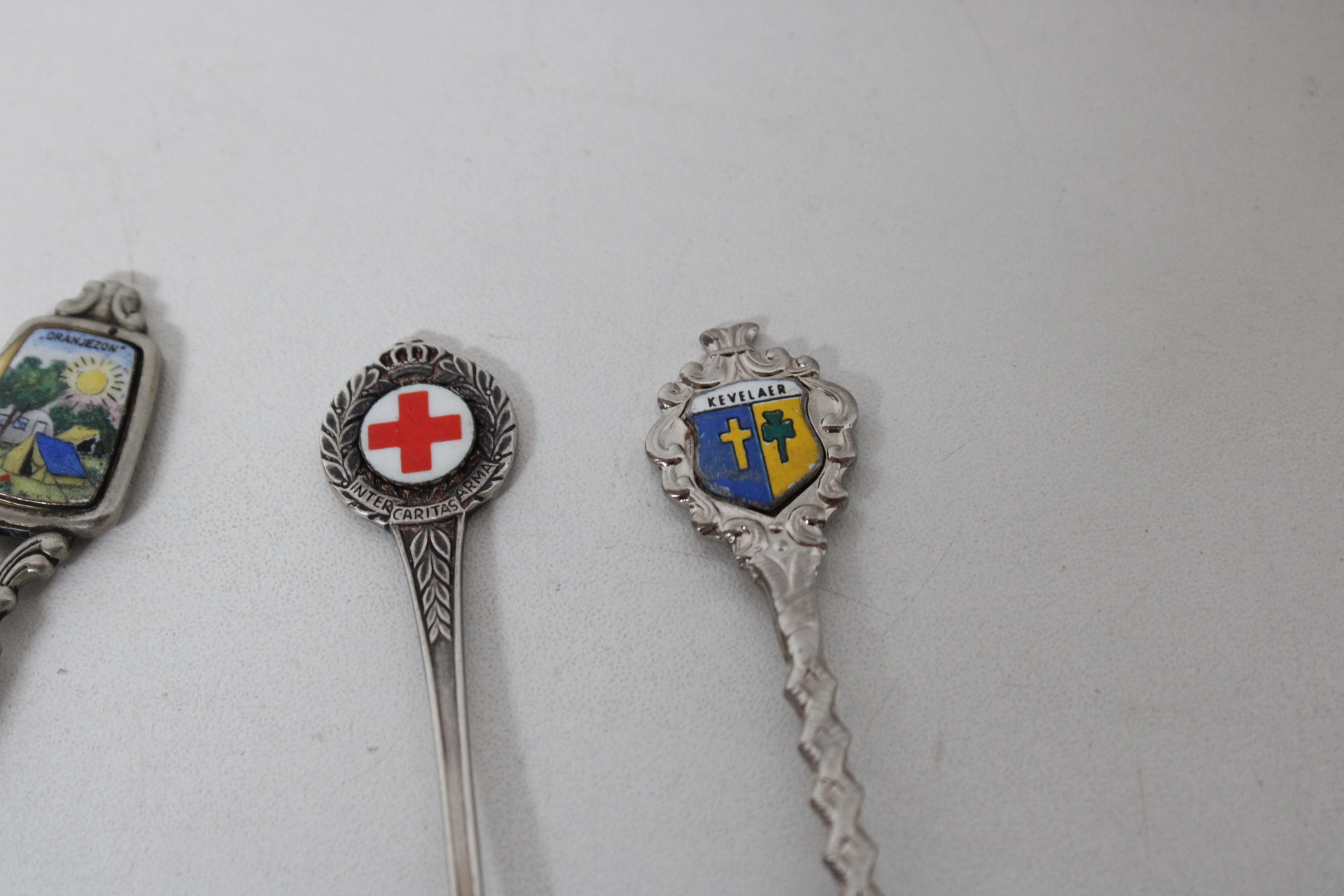 Verzameling van zilveren souvenirs lepels – foto 9 – kavel bij GSD Auctions, Zoeterwoude