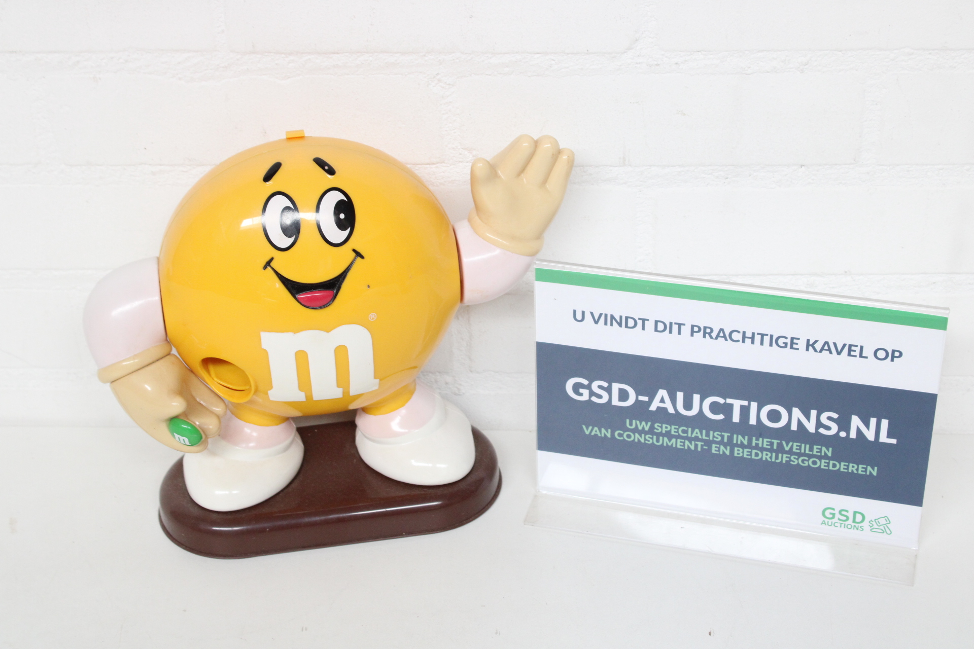M&M's spaarpot geel figuur – kavel bij GSD Auctions, Zoeterwoude