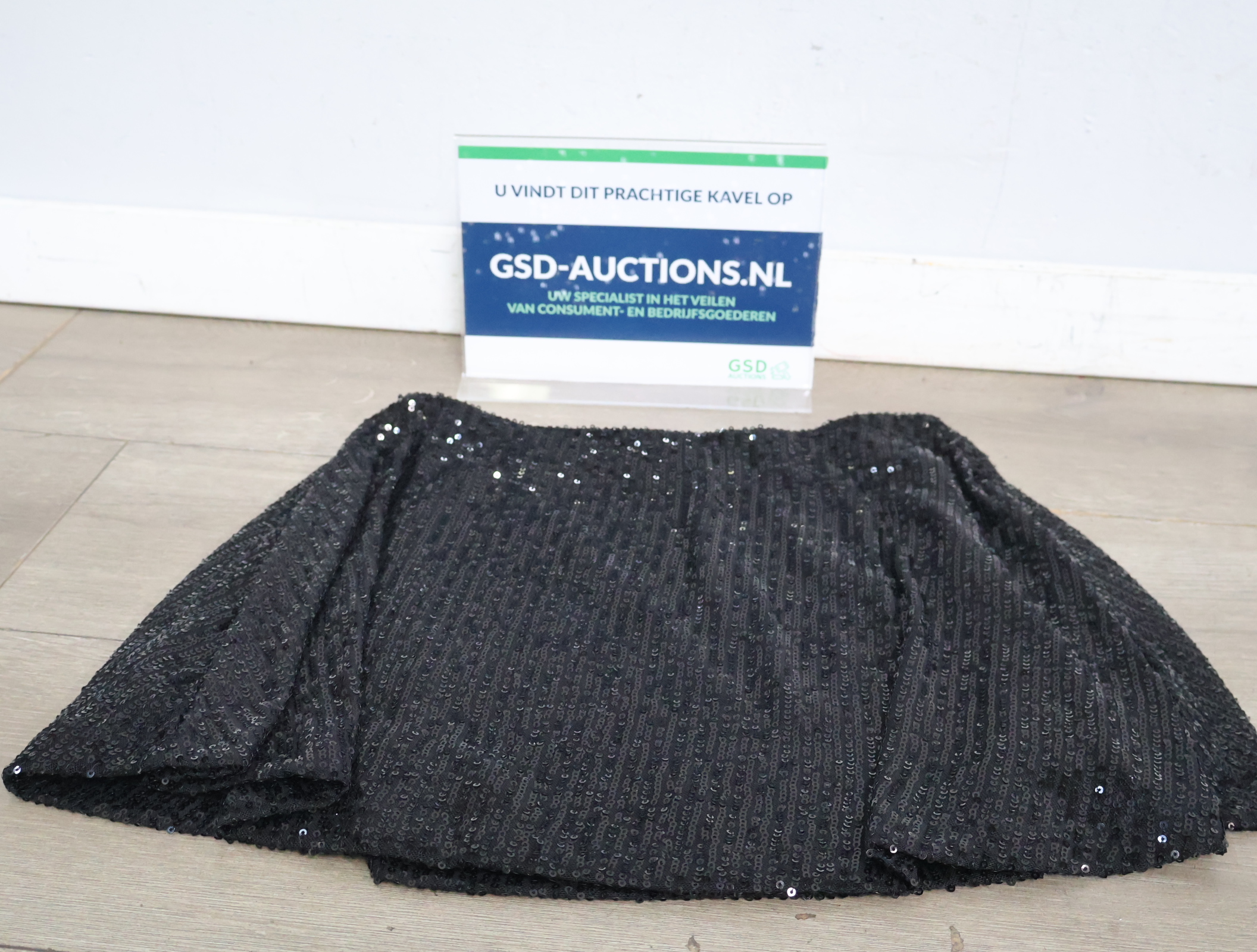 Zwarte pailletten rok'' – kavel bij GSD Auctions, Zoeterwoude