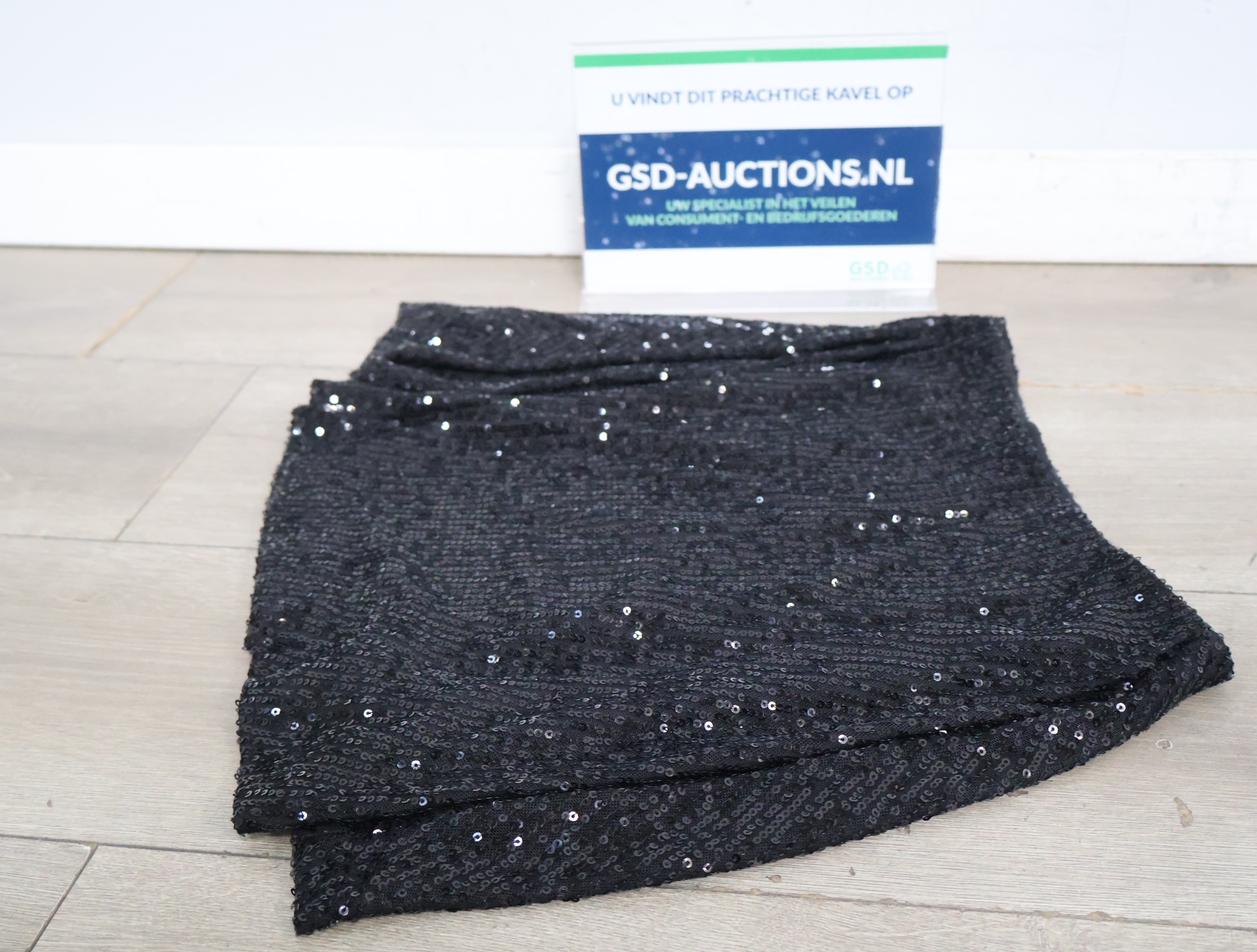 Zwarte pailletten rok'' – foto 2 – kavel bij GSD Auctions, Zoeterwoude