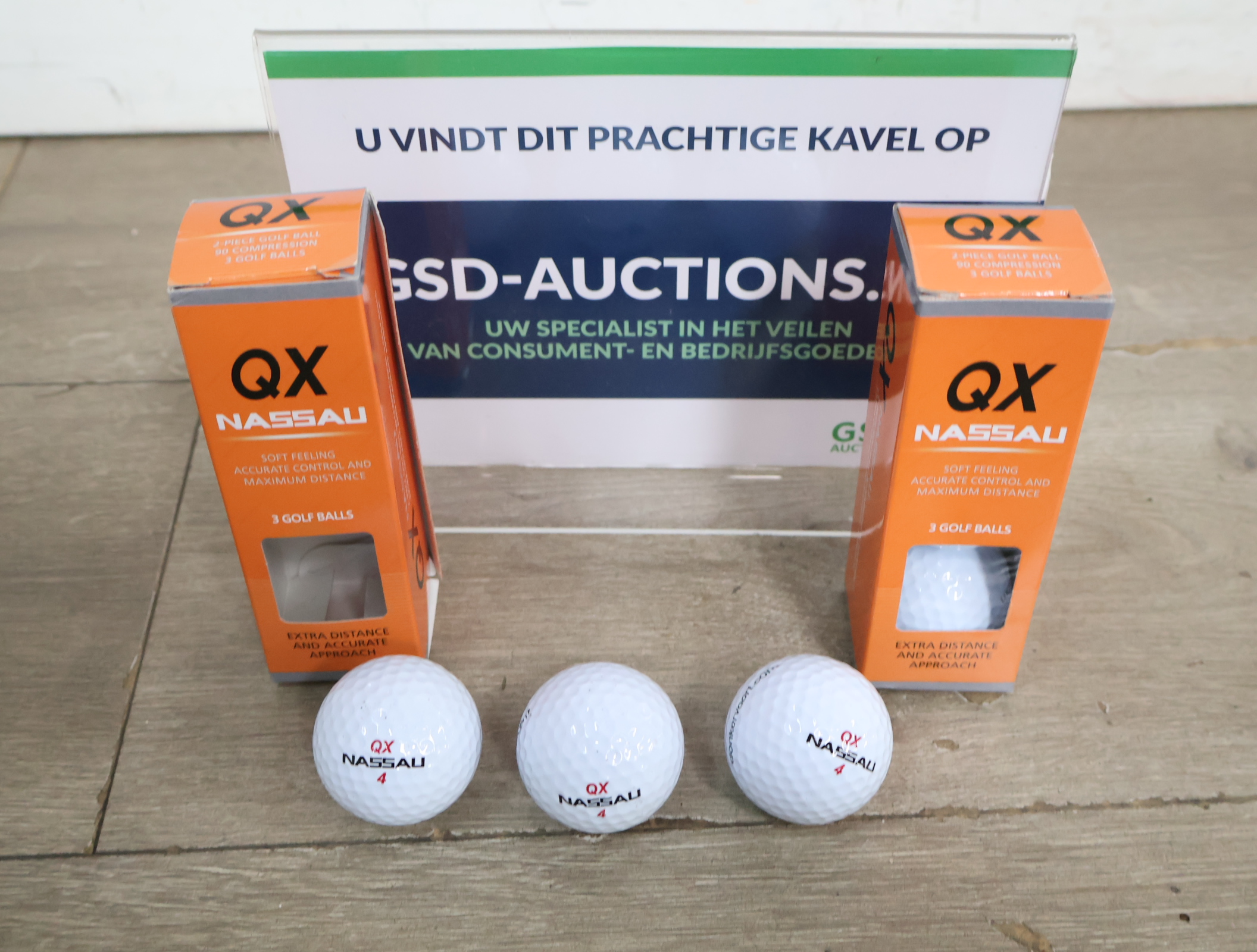 Set golfballen QX Nassau'' – kavel bij GSD Auctions, Zoeterwoude