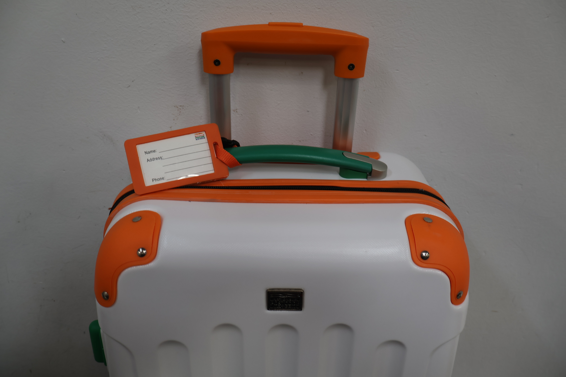 Harde koffer met oranje en groene accenten – foto 5 – kavel bij GSD Auctions, Zoeterwoude