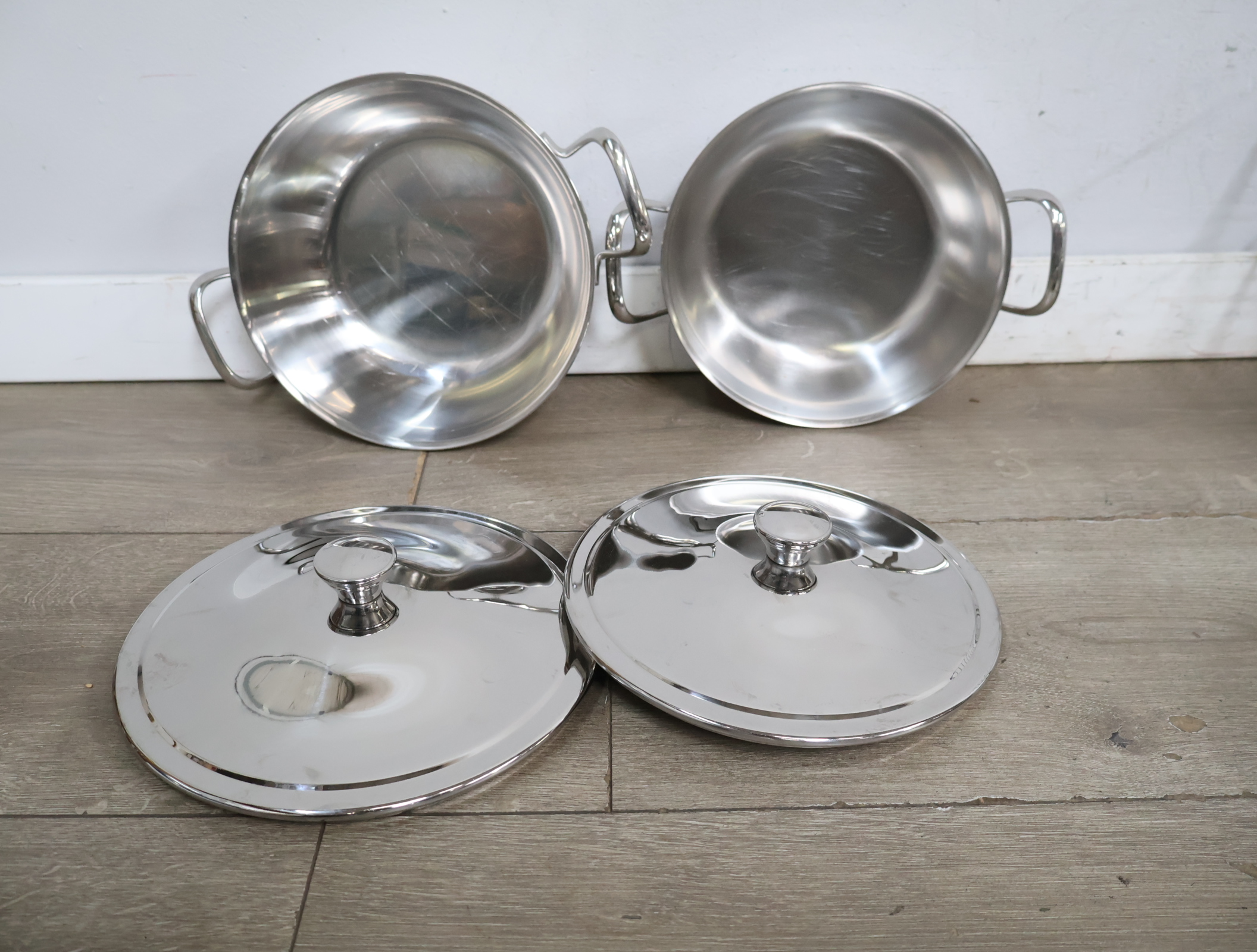 RVS Alessi pannenset met vergiet en een pannenrek – foto 10 – kavel bij GSD Auctions, Zoeterwoude