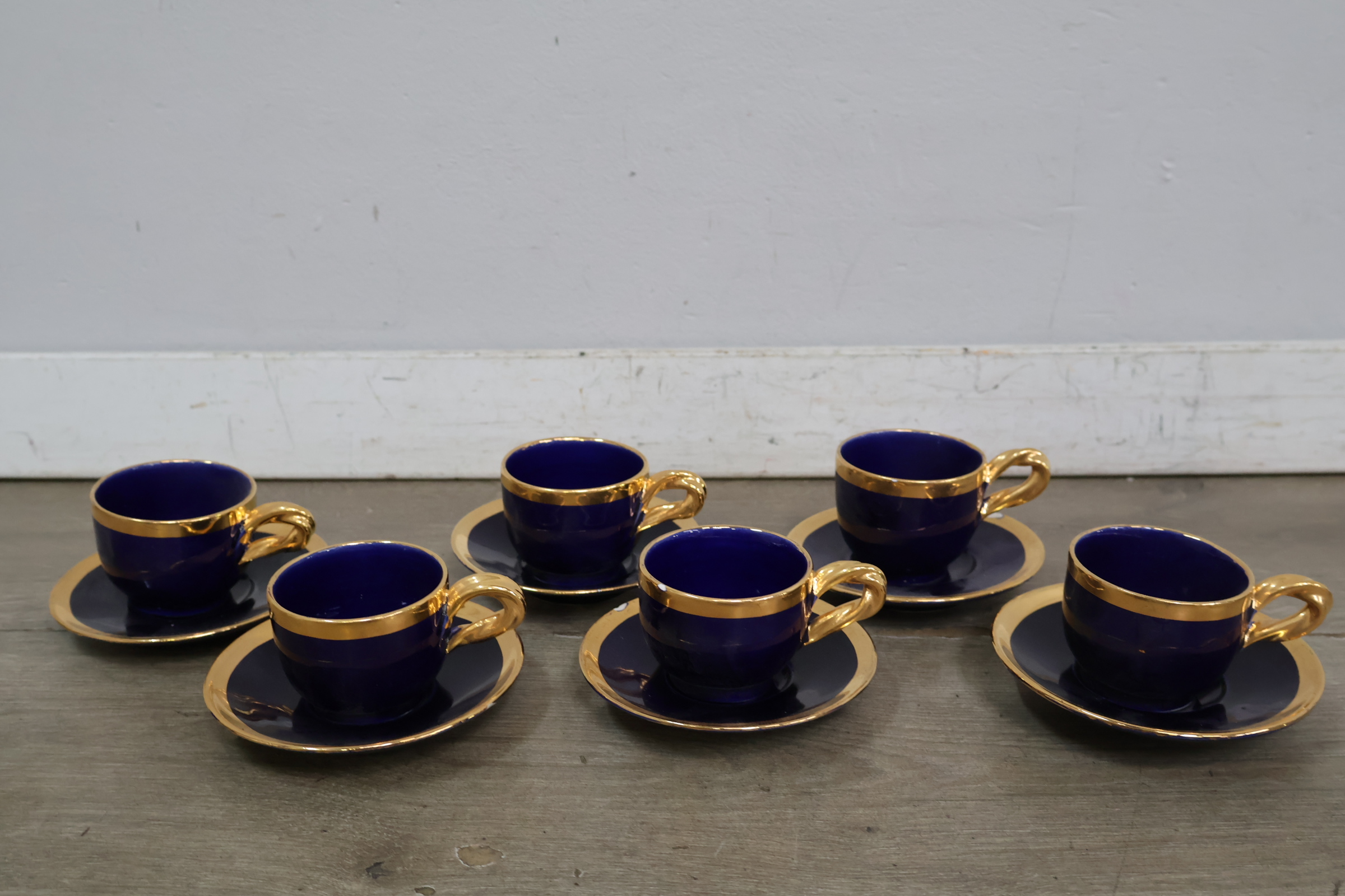 Set van 11 porseleinen espresso kop en schotels – foto 5 – kavel bij GSD Auctions, Zoeterwoude