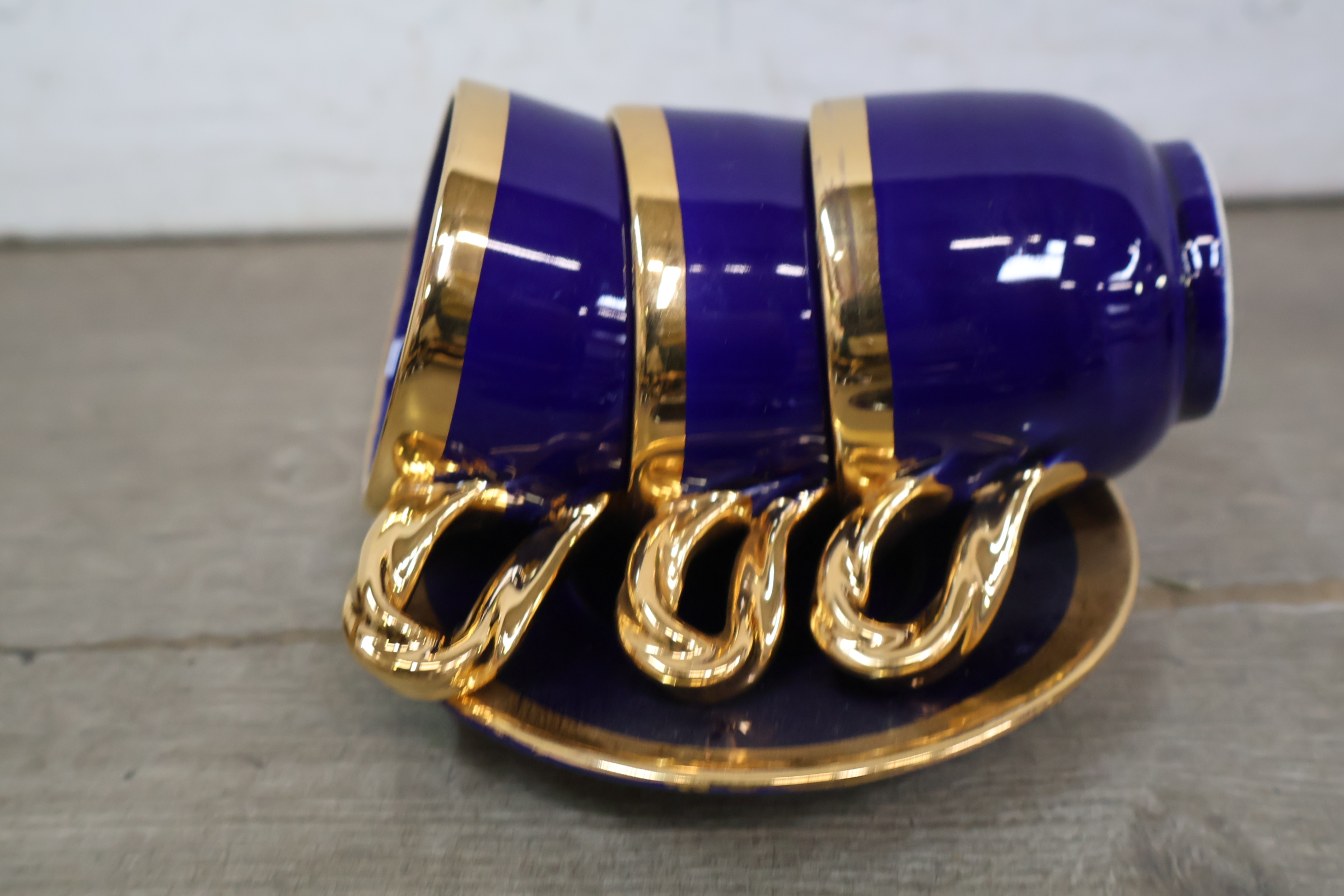 Set van 11 porseleinen espresso kop en schotels – foto 10 – kavel bij GSD Auctions, Zoeterwoude