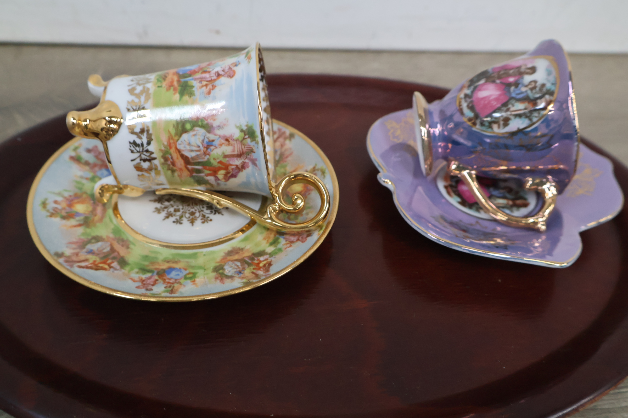 Set diverse porseleinen theekopjes en schotels met bloemenmotief – foto 10 – kavel bij GSD Auctions, Zoeterwoude