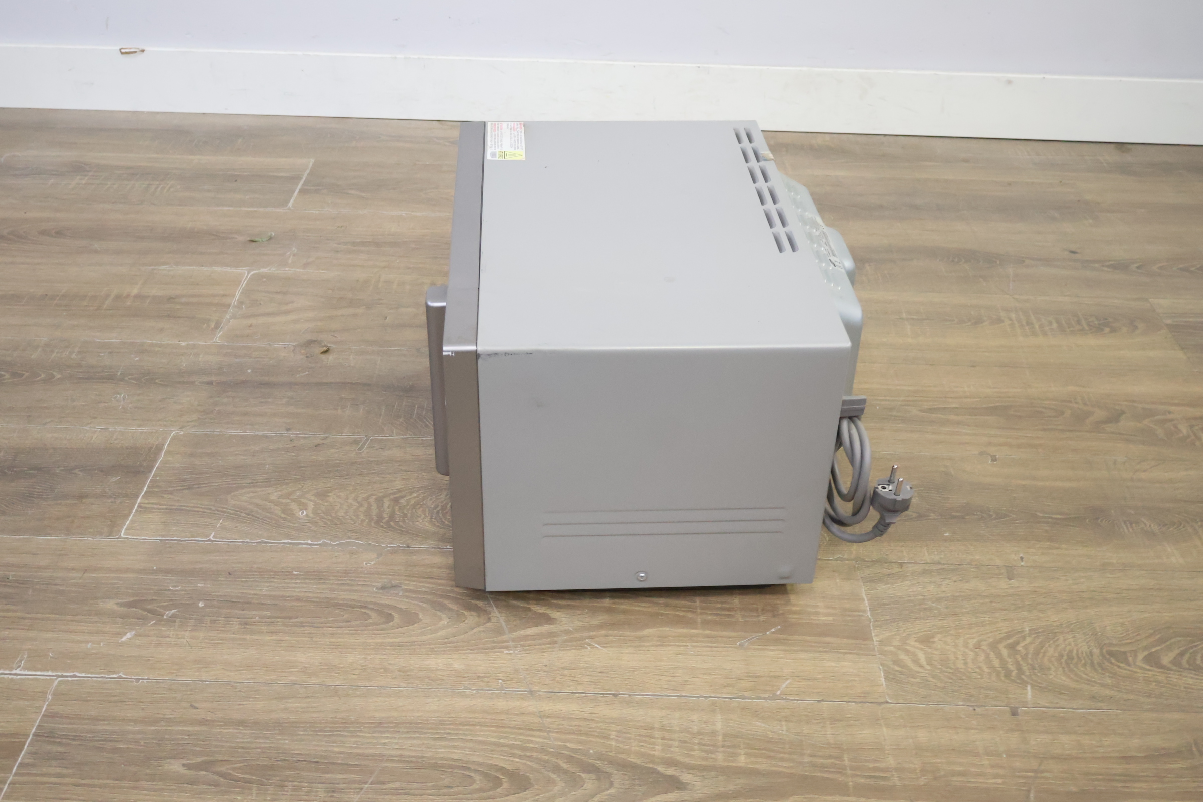 Samsung magnetron 23L zilver – foto 8 – kavel bij GSD Auctions, Zoeterwoude