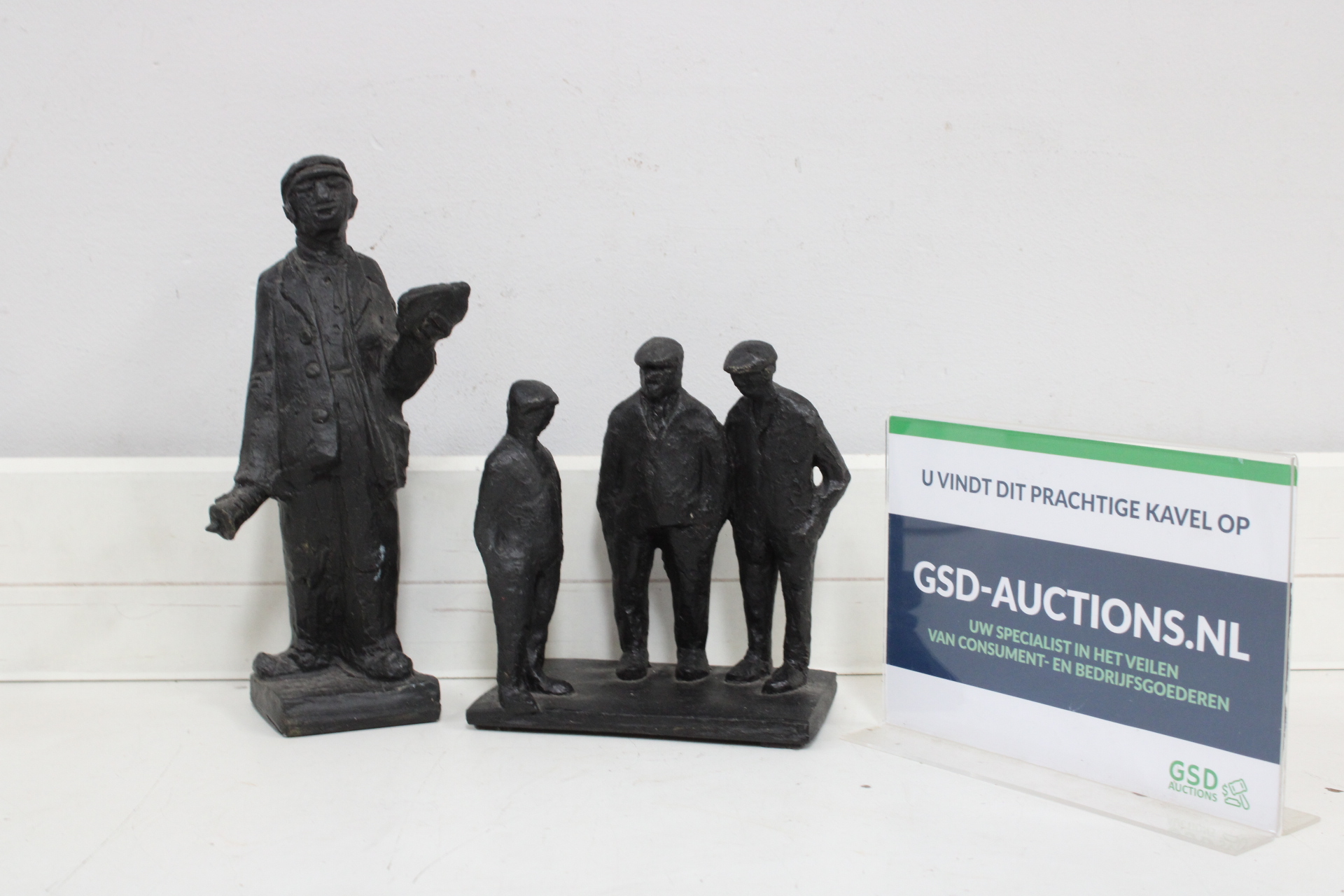 Set zwarte metalen beeldjes van vier heren – kavel bij GSD Auctions, Zoeterwoude