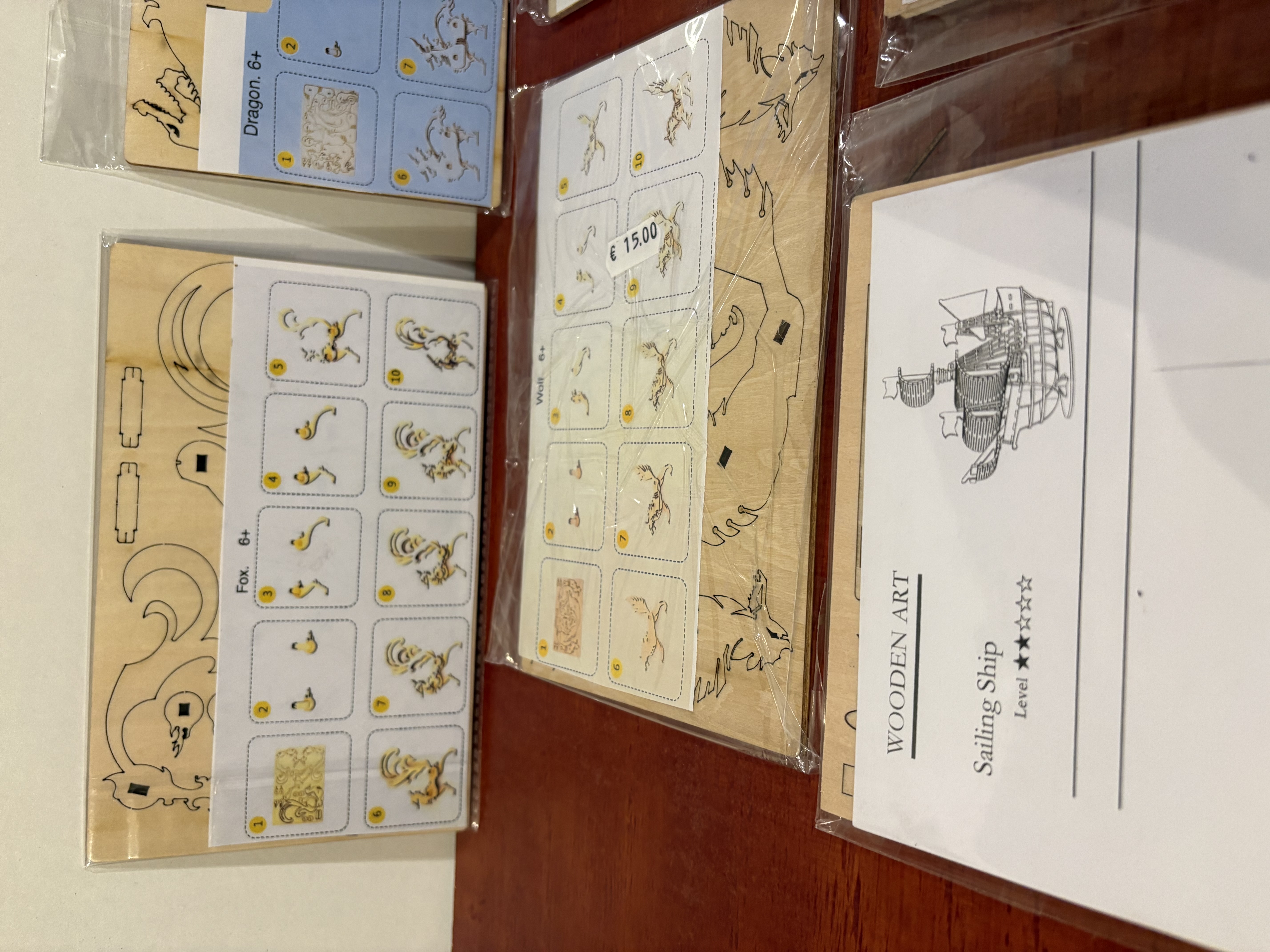 Houten 3D puzzels 9 stuks nieuwe – foto 2 – kavel bij GSD Auctions, Zoeterwoude