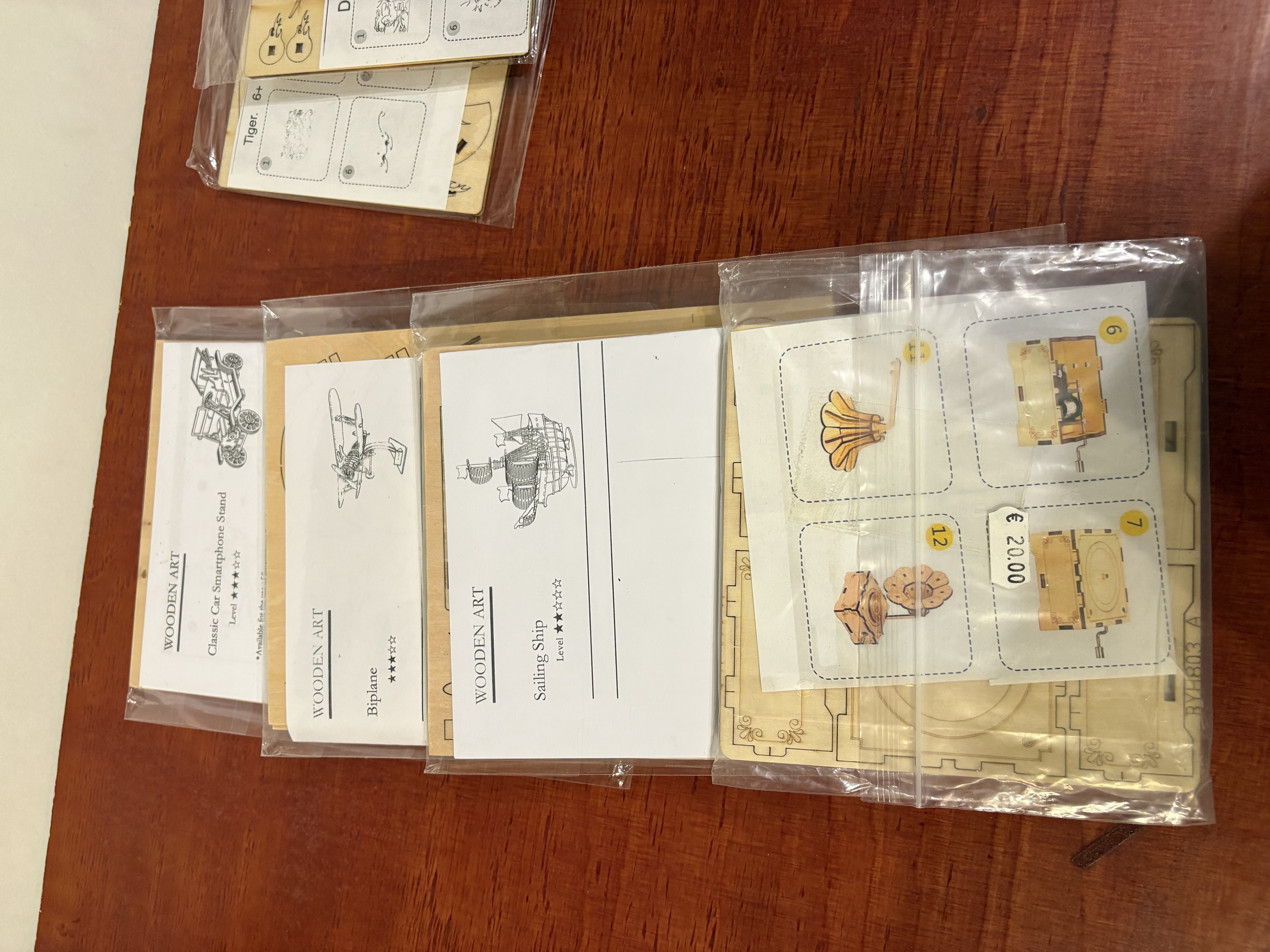 Houten 3D puzzels 9 stuks nieuwe – foto 5 – kavel bij GSD Auctions, Zoeterwoude