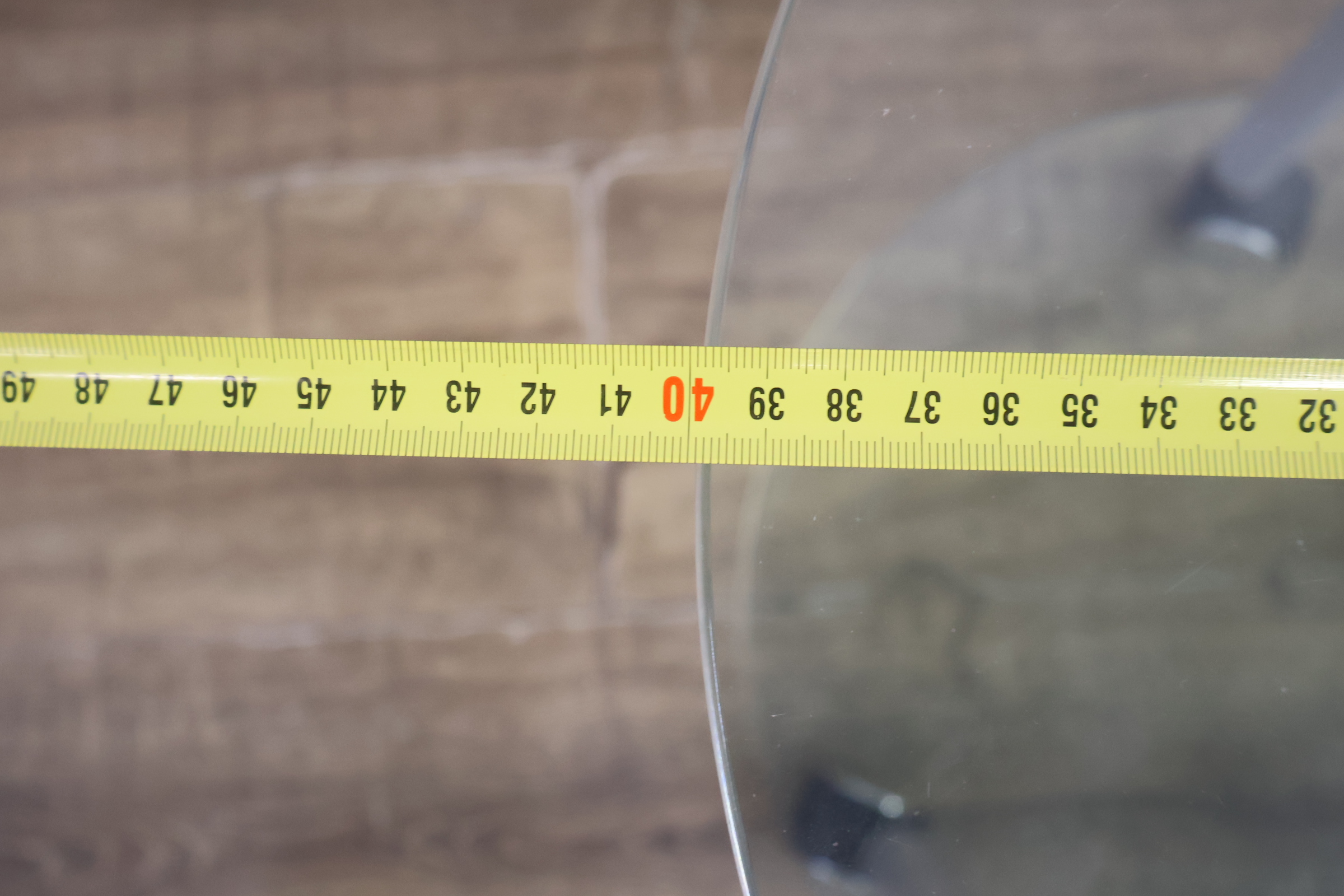 Rond glazen bijzettafeltje met wieltjes – foto 11 – kavel bij GSD Auctions, Zoeterwoude