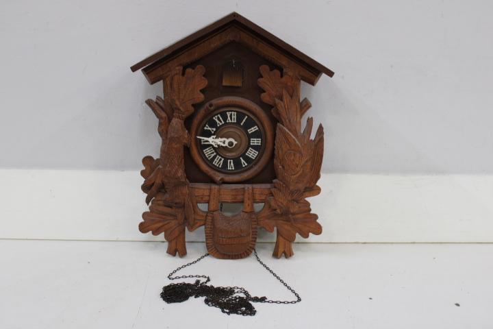 Houten koekoeksklok met houtsnijwerk – foto 9 – kavel bij GSD Auctions, Zoeterwoude