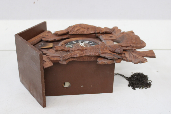 Houten koekoeksklok met houtsnijwerk – foto 19 – kavel bij GSD Auctions, Zoeterwoude
