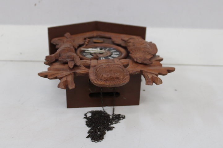 Houten koekoeksklok met houtsnijwerk – foto 20 – kavel bij GSD Auctions, Zoeterwoude