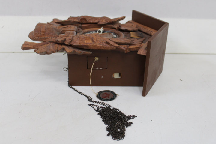Houten koekoeksklok met houtsnijwerk – foto 21 – kavel bij GSD Auctions, Zoeterwoude