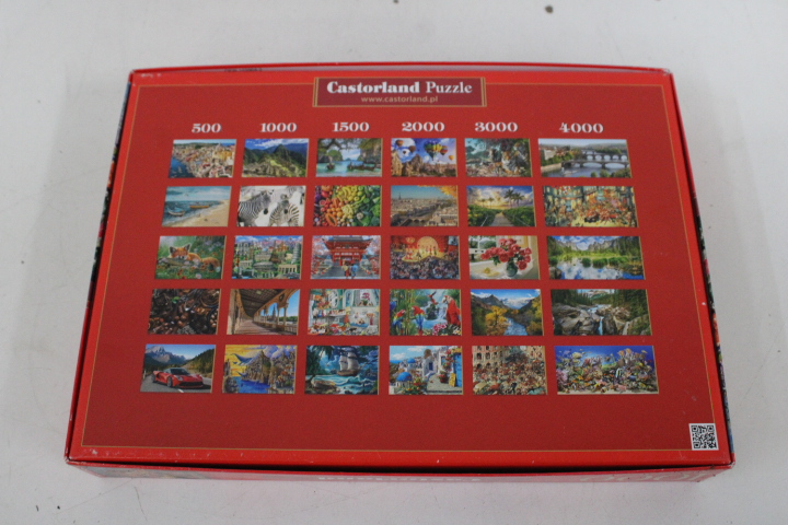 set van 3 Ravensburger en Castorland Puzzels 1000 stukjes – foto 3 – kavel bij GSD Auctions, Zoeterwoude