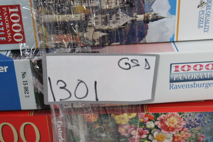 set van 3 Ravensburger en Castorland Puzzels 1000 stukjes – foto 20 – kavel bij GSD Auctions, Zoeterwoude