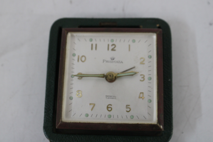 Set van zeven kleine reisklokken en tafelklokken – foto 11 – kavel bij GSD Auctions, Zoeterwoude