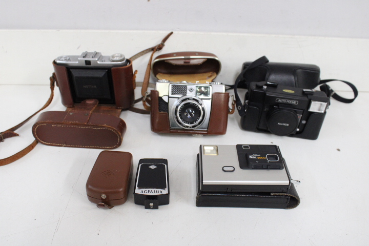 Vintage camera's met leren tas – foto 4 – kavel bij GSD Auctions, Zoeterwoude