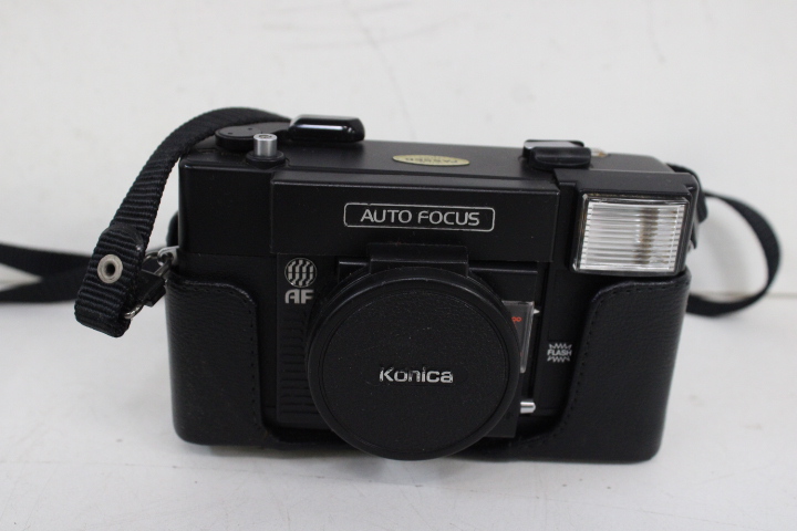 Vintage camera's met leren tas – foto 13 – kavel bij GSD Auctions, Zoeterwoude