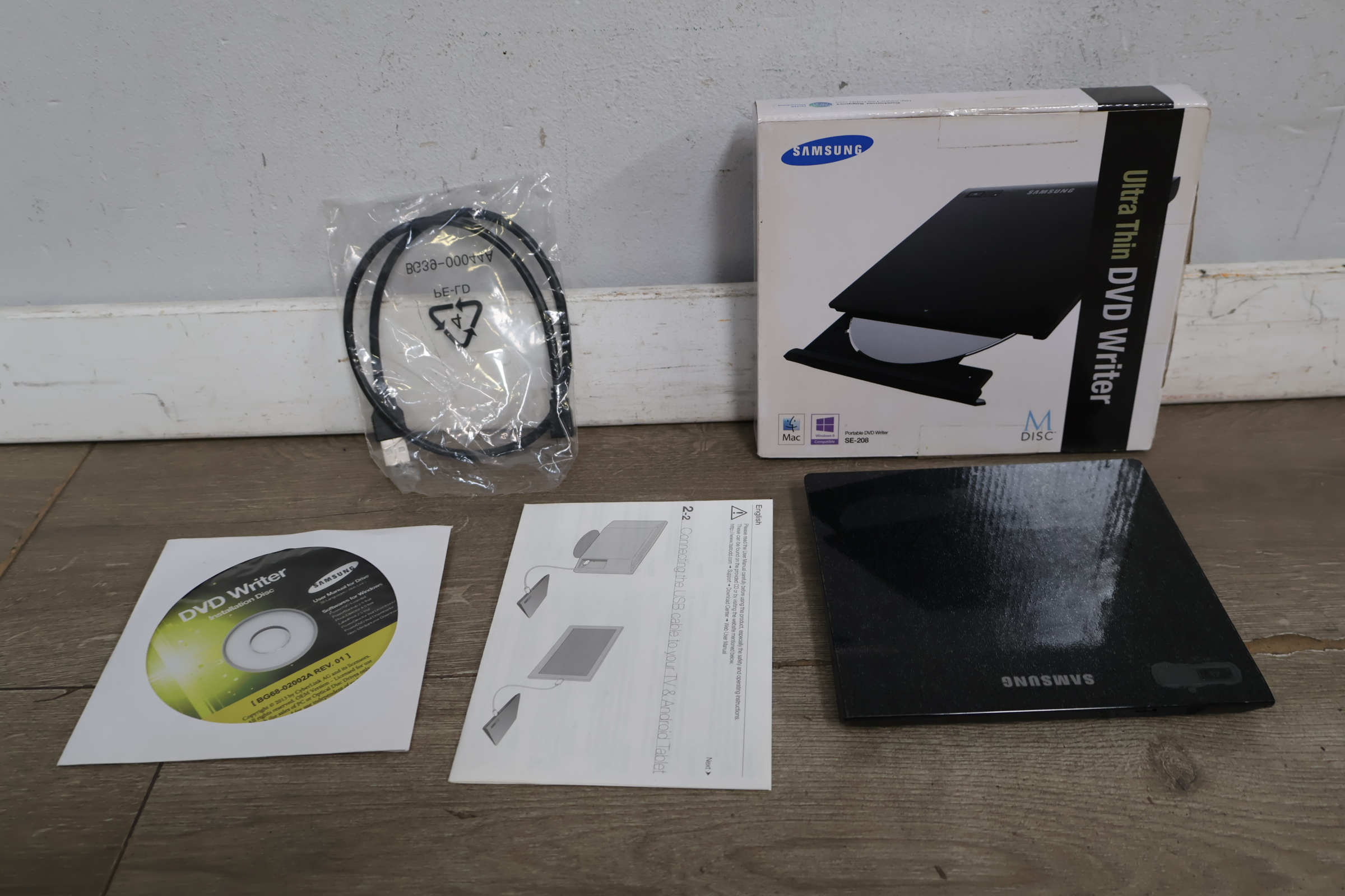 Samsung Ultra Thin DVD Writer SE-208 – foto 3 – kavel bij GSD Auctions, Zoeterwoude