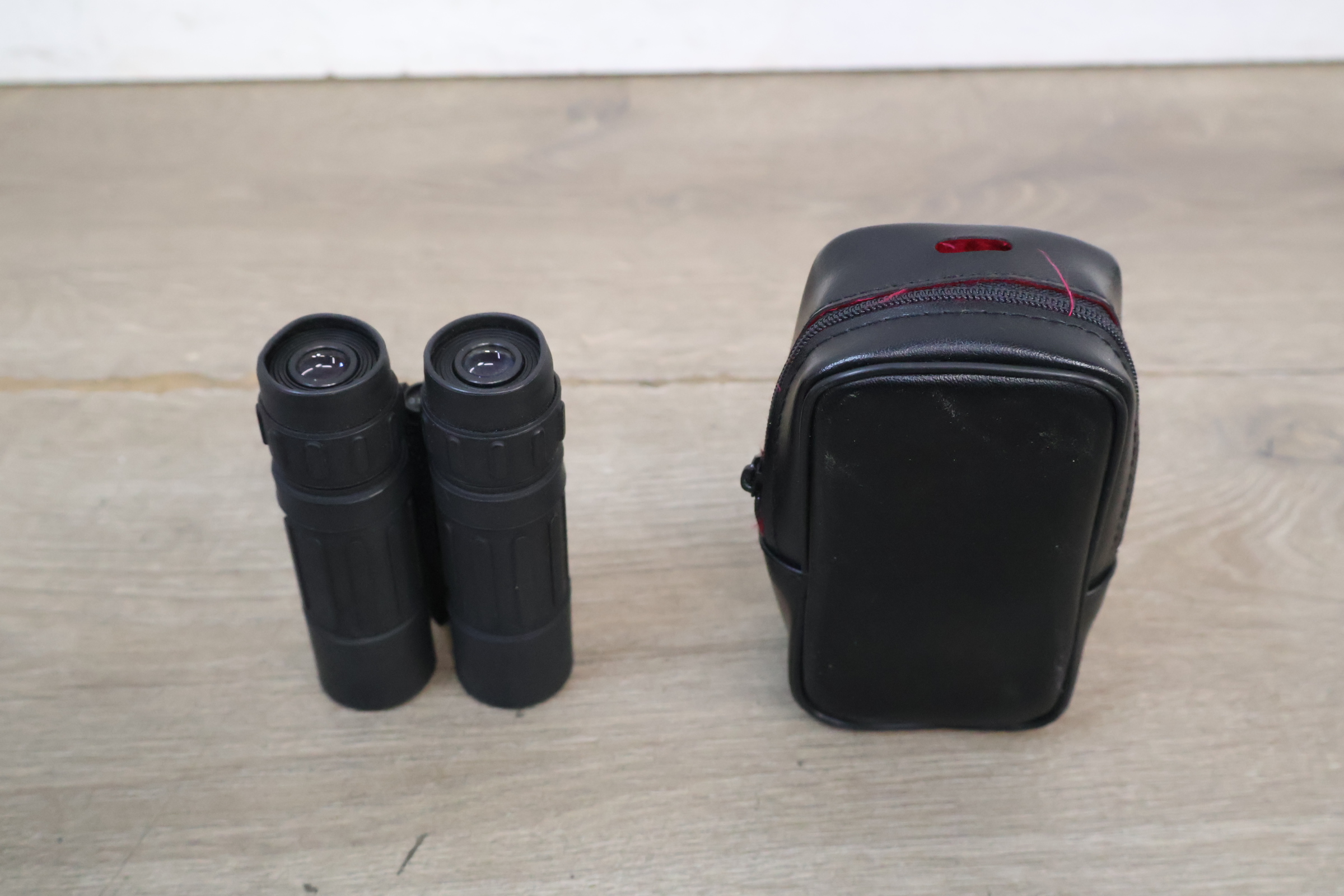 Vouwkijker met draagtas – foto 3 – kavel bij GSD Auctions, Zoeterwoude