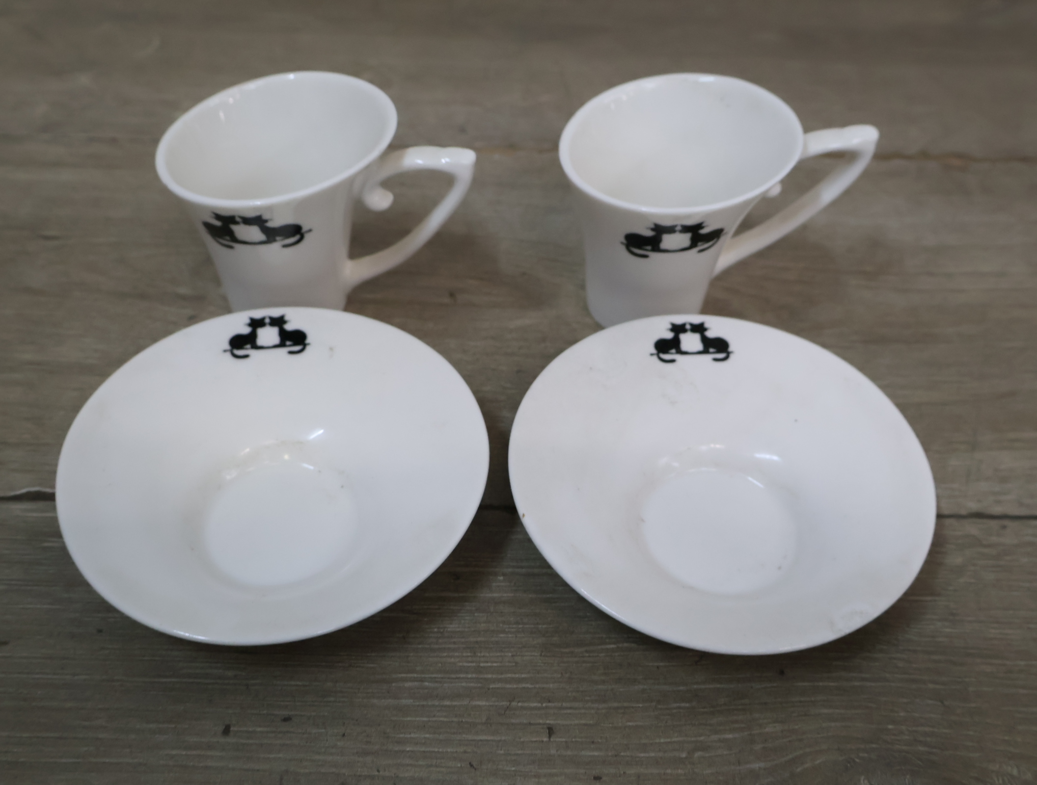 Set van 2 porseleinen kop en schotels – foto 9 – kavel bij GSD Auctions, Zoeterwoude