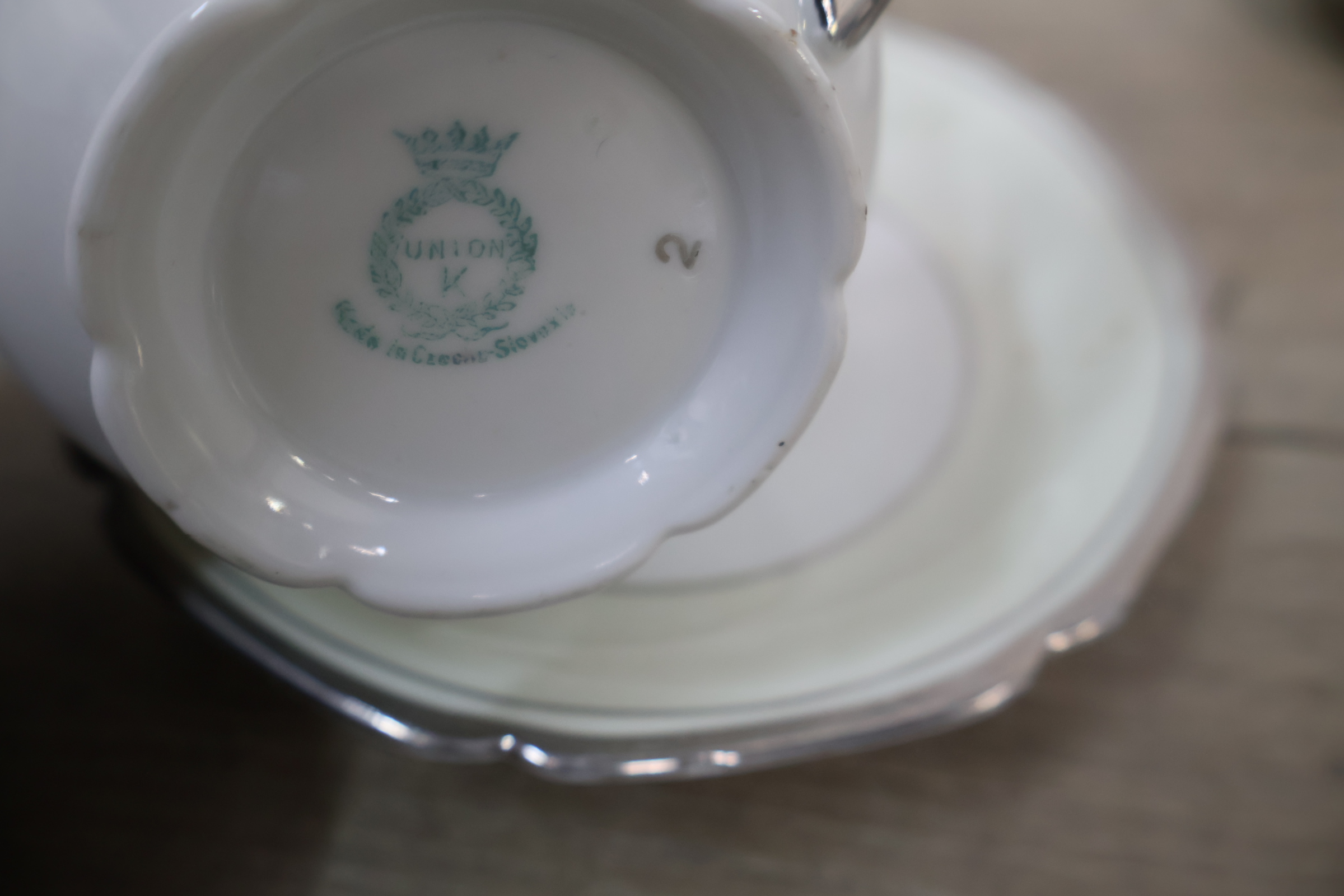 Set porseleinen kop en schotels' – foto 12 – kavel bij GSD Auctions, Zoeterwoude
