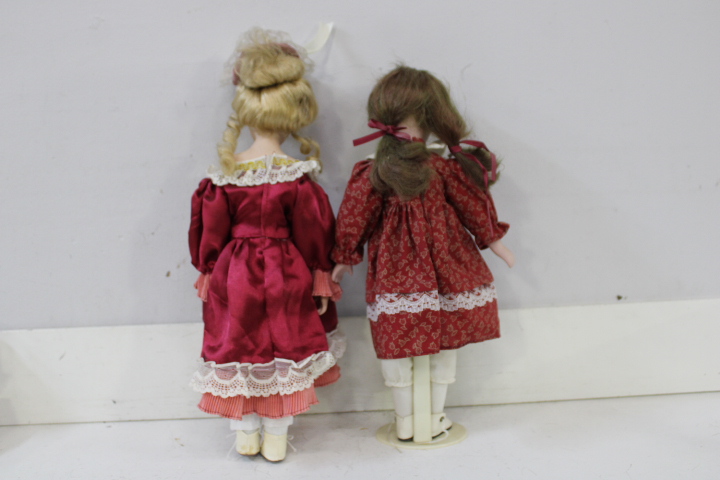 Set van acht vintage porseleinen poppen met kleding – foto 13 – kavel bij GSD Auctions, Zoeterwoude