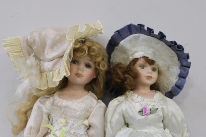 Set van acht vintage porseleinen poppen met kleding – foto 15 – kavel bij GSD Auctions, Zoeterwoude