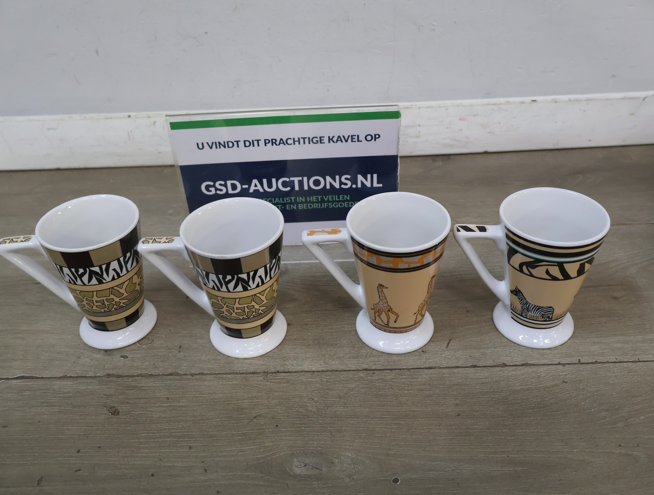 Set van 4 keramische mokken met dierenprint – foto 2 – kavel bij GSD Auctions, Zoeterwoude