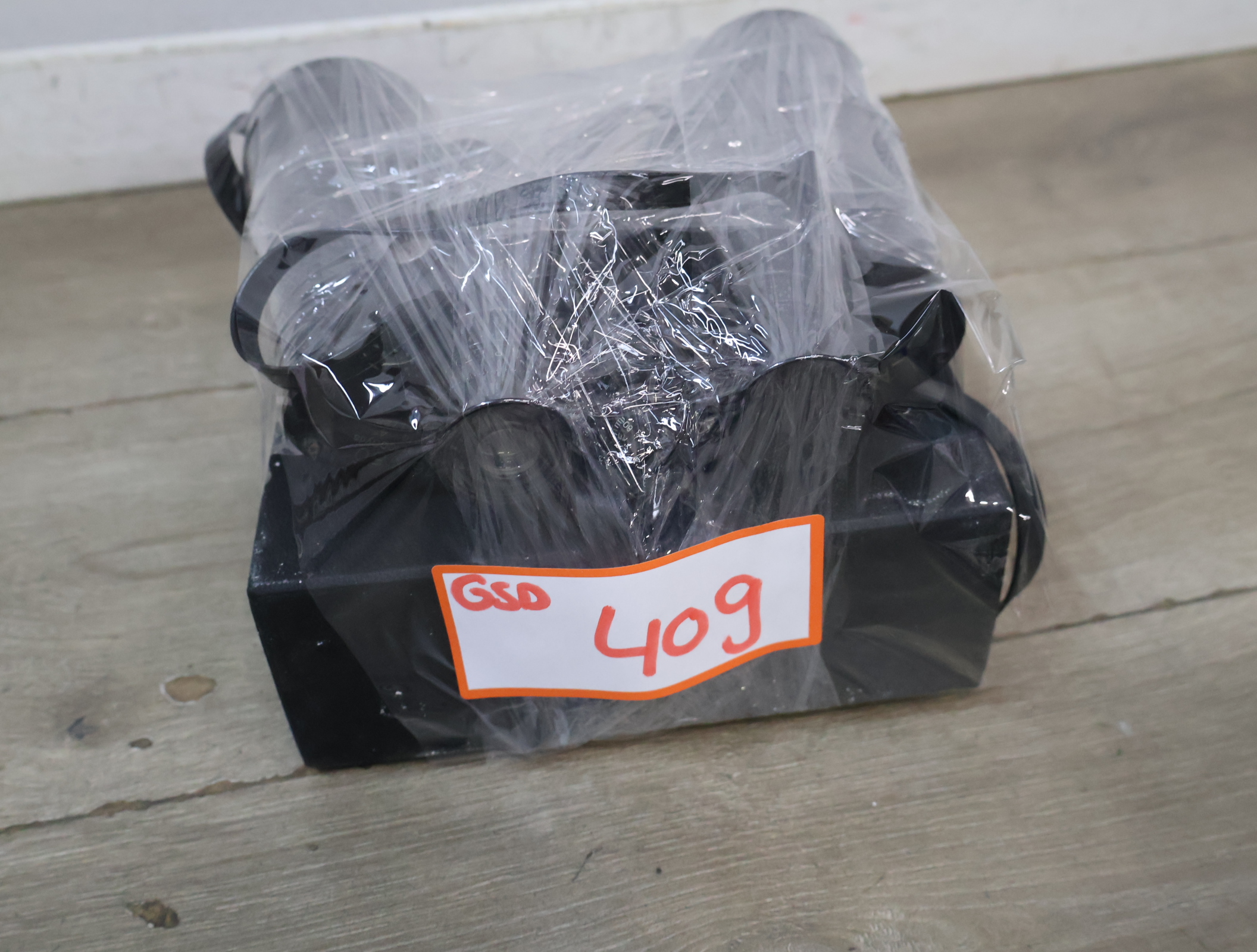 Twee zwarte verrekijkers – foto 19 – kavel bij GSD Auctions, Zoeterwoude