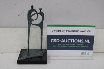 Afbeelding van Abstract bronzen beeld op zwart marmeren voet