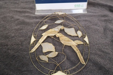 Afbeelding van Decoratief wandornament met vogels van parelmoer