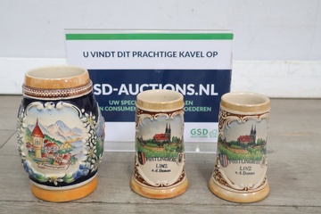 Afbeelding van Set van drie decoratieve keramische bierpullen
