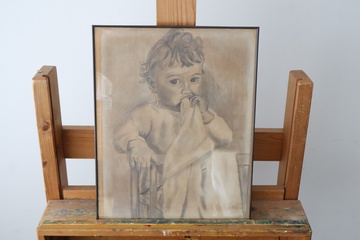 Afbeelding van Zwart-wit potloodtekening van een kind in lijst